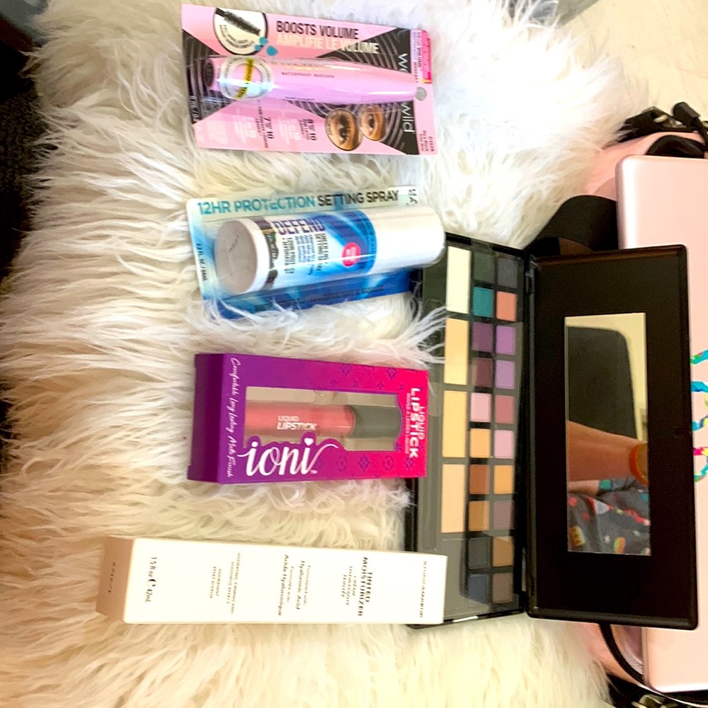 Lot of makeup lipstick, mascara, large eye shadow palette and more
